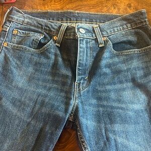 Levis 511. 31x32. Frayed hem.
